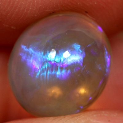 SOLID CRYSTAL OPAL Large opal with bright blue and purple rolling flashes